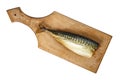 Image of smoked headless mackerel on kitchen wooden board Royalty Free Stock Photo
