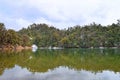 Deoria or Deoriya Tal Lake with Lush Green Trees and Snow - Winter Himalayan Landscape, Uttarakhand, India