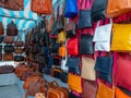 bags of various colours and types in a flea market Royalty Free Stock Photo