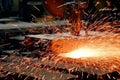 Image of sparks flying during the steel fabrication process, capturing the energy and craftsmanship involved in steel production.