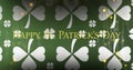Image of st patrick\'s day text, shamrock on green background Royalty Free Stock Photo