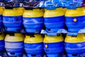 Image of a stack of blue and yellow beer barrels Royalty Free Stock Photo