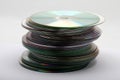 Image of a stack of DVDs and CDs taken from a sideways view Royalty Free Stock Photo