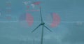 Image of statistical data processing over spinning windmill against blue sky Royalty Free Stock Photo