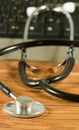 image of stethoscope and keyboardon the table close-up Royalty Free Stock Photo