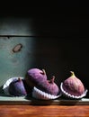 Image of Still Life with Figs. Dark antique wooden background
