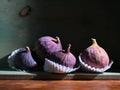 Image of Still Life with Figs. Dark antique wooden background