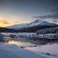 Stunning Winter panorama landscape image of mountain range viewed from Loch Ba in Scottish Highlands with dramatic Royalty Free Stock Photo