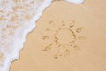 Image of sun drawing on sand