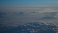 Image of Sunrise above the clouds from airplane window, India