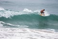 Surfer on Blue Ocean Wave, Bali, Indonesia. Riding in tube. Royalty Free Stock Photo