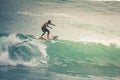 Surfer on Blue Ocean Wave, Bali, Indonesia. Riding in tube. Royalty Free Stock Photo