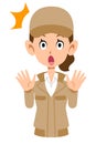 Surprised beige woman in workwear