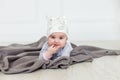 Image of sweet baby girl in a wreath, closeup portrait of cute 6 month old smiling girl, toddler. Cute hat on a head Royalty Free Stock Photo
