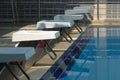 Image of swimming pool with starting blocks. Royalty Free Stock Photo