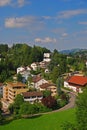 Tranquil peaceful view of residence residential houses with winding road in Lucerne, Switzerland with Swiss typical home buildings