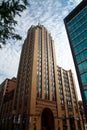 Tall Lansing skyscraper next to a glass-windowed building Royalty Free Stock Photo