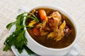 Tasty scottish traditional soup cock-a-leekie with chicken, bacon and leek