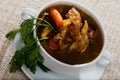 Tasty scottish traditional soup cock-a-leekie with chicken, bacon and leek