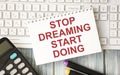 Image with a text -stop dreaming start doing