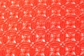 Image texture background, Detail of woven woolen texture of design and lace. Red fabric background. Decorative lace with a patter