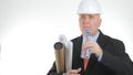 Image with a Thirsty Engineer Drinking Fresh Water from a Bottle Royalty Free Stock Photo