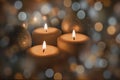 Image of three burning candles, Christmas tree toys with blue and gold bokeh effect Royalty Free Stock Photo