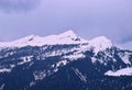 Three Himalayan Peaks of Shivalik Range - Blue Mountains Covered by White Snow with Cloudy Sky in Background - India, Asia