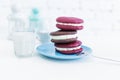 Image of three whoopie pies or moon pies with glass of milk and spoon. Royalty Free Stock Photo