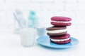 Image of three whoopie pies or moon pies with glass of milk and spoon. Royalty Free Stock Photo