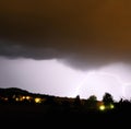 Image of thunder lightning against grey stormy sky with copy space