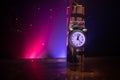 Image of a time bomb against dark background. Timer counting down to detonation illuminated in a shaft light shining through the Royalty Free Stock Photo