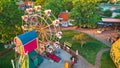 Tourist ferris wheel up close aerial with dutch village in background