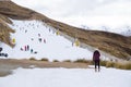 An image of tourist at treble cone field skiing for starting up the winter season in New Zealand.