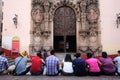 Image of tourists waiting for a night alley through the streets of Guanajuato