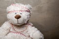 Image of toy bear construction centimetre sharp wall Royalty Free Stock Photo