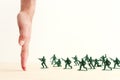 image of toy soldiers over wooden table Royalty Free Stock Photo