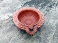 Traditional clay diya lamps lit during diwali celebration