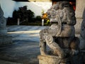 An image of a traditional oriental style stone carved lion figurine