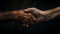 An image of two elderly individuals shaking hands in front of a dark background Royalty Free Stock Photo
