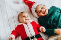 Image of two funny boys wearing christmas outfit