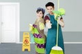 Two janitors with cleaning equipment Royalty Free Stock Photo