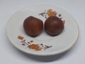 This is an image of two pieces gulab Jamun . Royalty Free Stock Photo