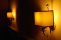 Small wall lamps with warm lighting Royalty Free Stock Photo