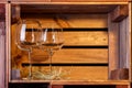 Image of two wine glasses in wooden boxes. Royalty Free Stock Photo