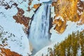 Up close to amazing Yellowstone Upper Falls in winter snow Royalty Free Stock Photo