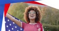 Image of usa elections text and american flag, diverse man with vote badge and woman waving flag Royalty Free Stock Photo