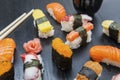 Variety delicious sushi with chopstick