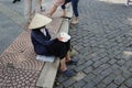 Vietnamese person wearing a cone hat
