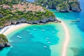 View from above, stunning aerial view of a bay with boats and luxury yachts sailing on a turquoise, clear